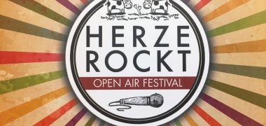 Plakat vom Musikfest Herzerockt